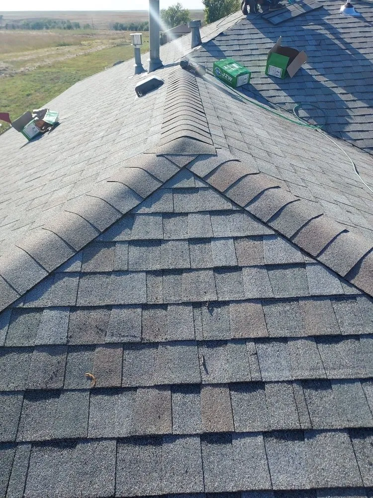 Slide of 1HundredX Roofing