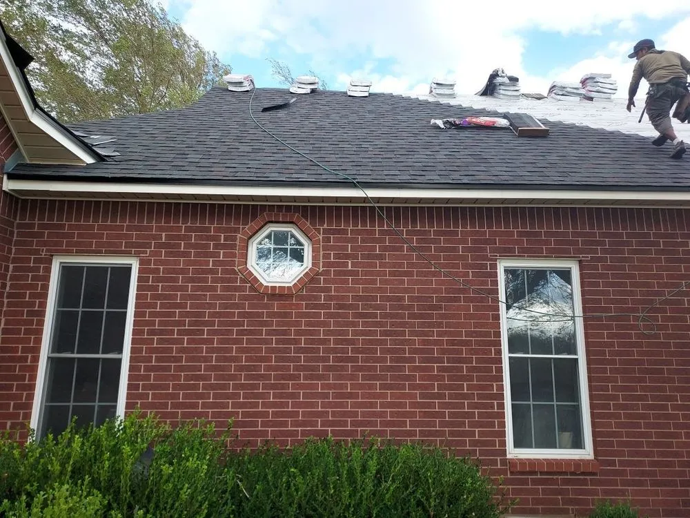 Slide of 1HundredX Roofing