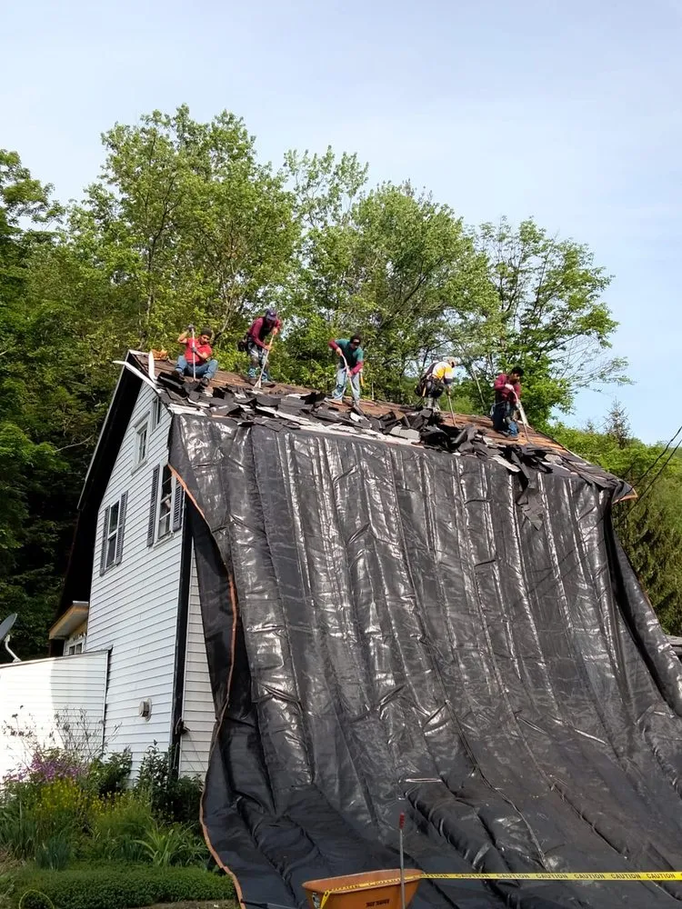 Slide of 1st Choice Roofers & Renovations