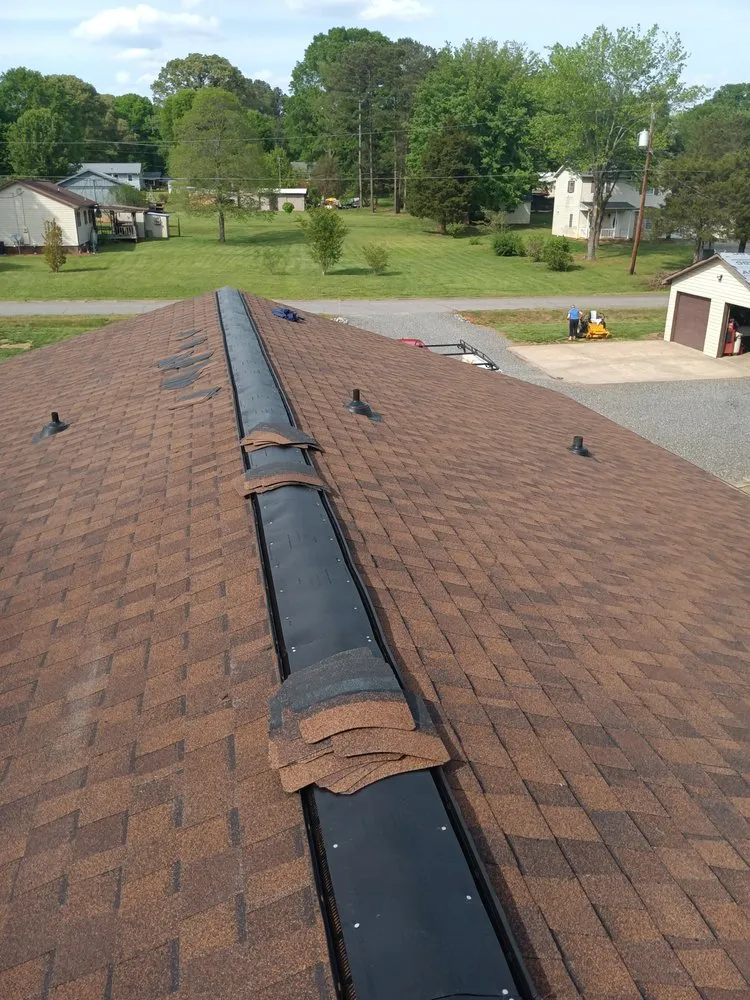 Slide of 1st Choice Roofing