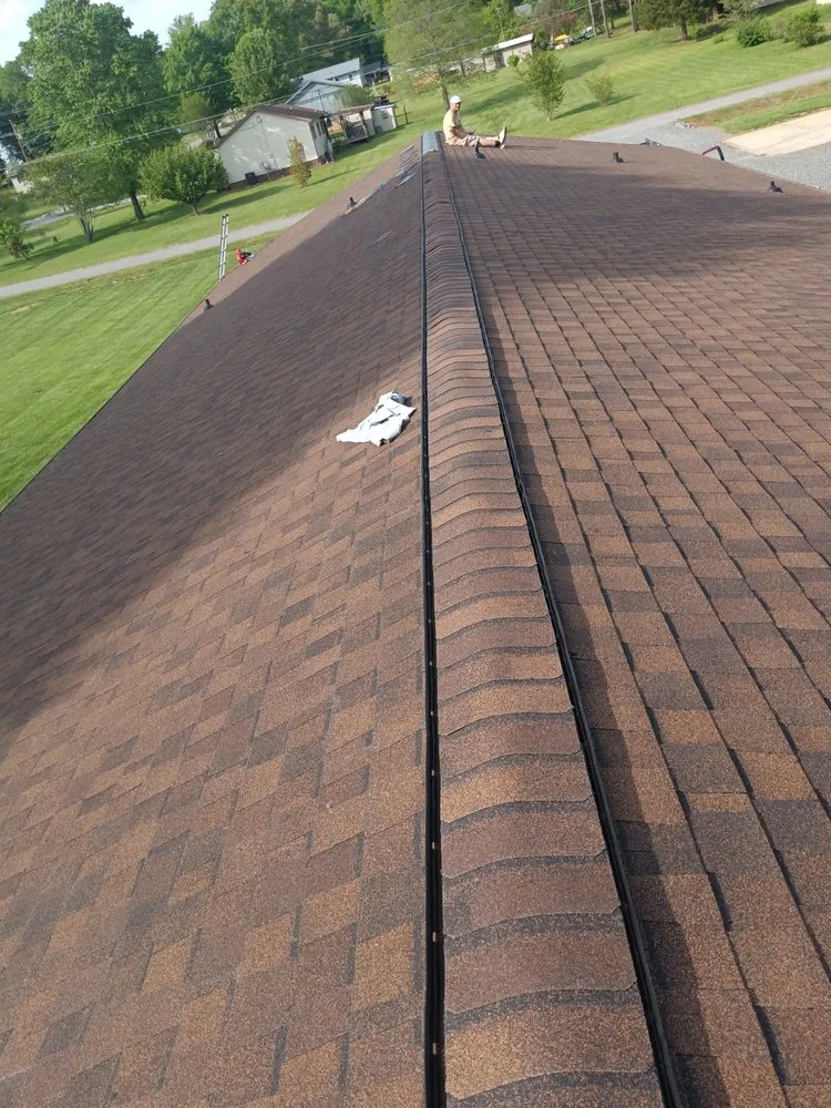Slide of 1st Choice Roofing