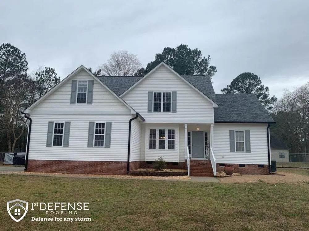 Slide of 1st Defense Roofing