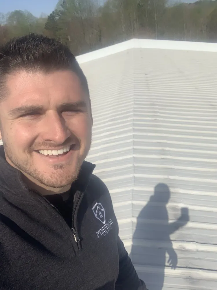 Slide of 1st Defense Roofing