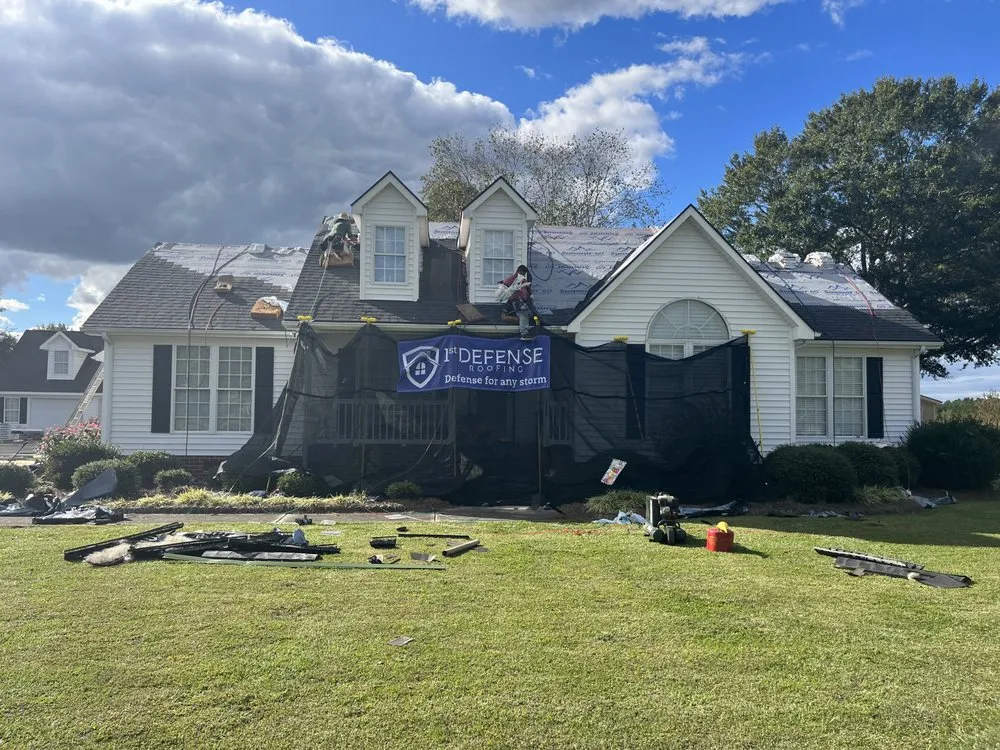 Slide of 1st Defense Roofing