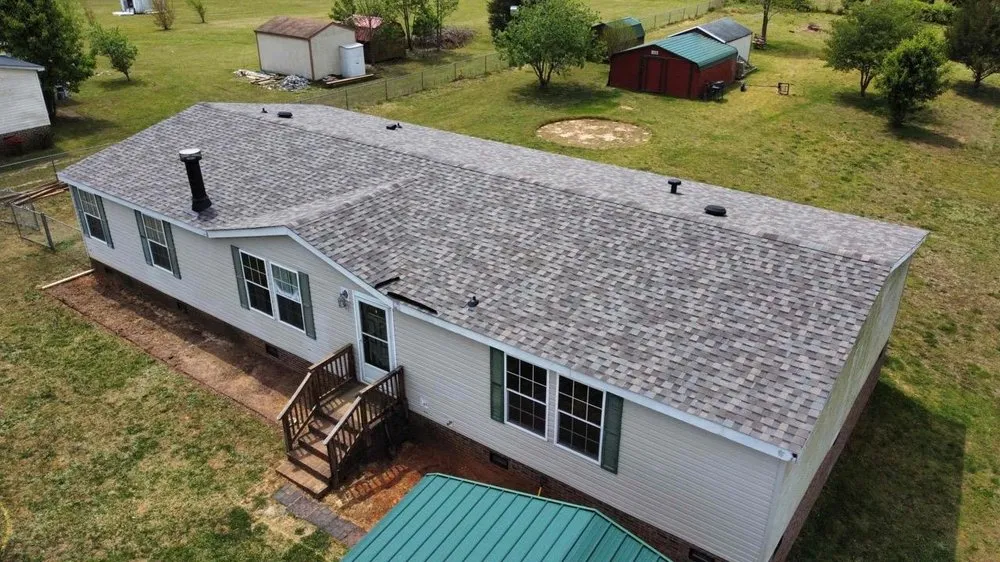 Slide of 1st Defense Roofing