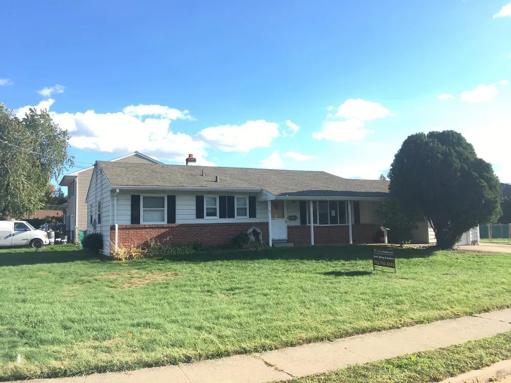 Slide of 1st Quality Exteriors