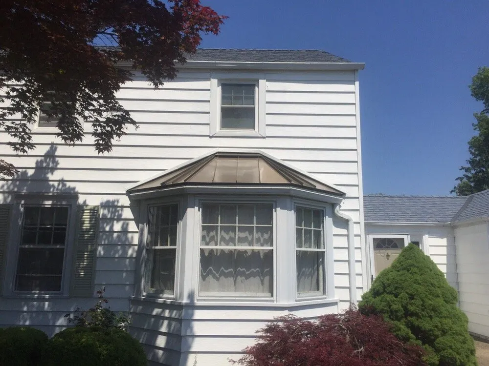 Slide of 1st Quality Exteriors