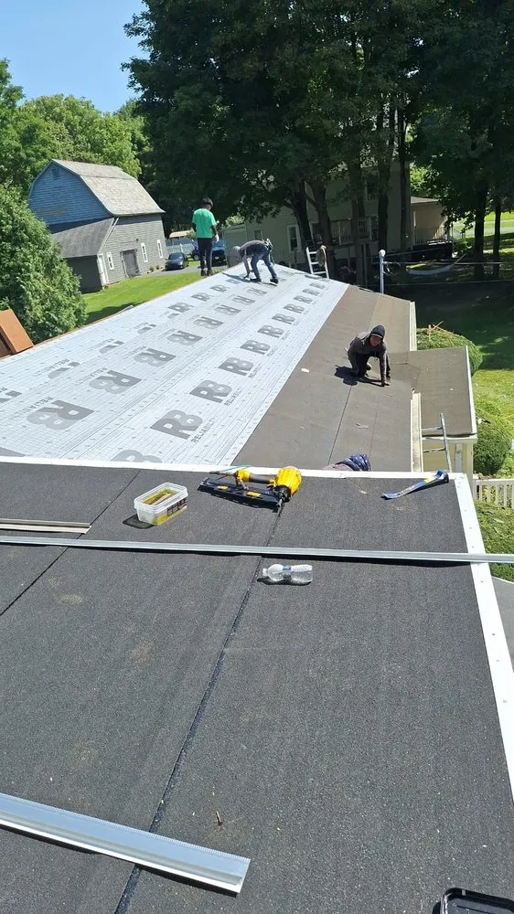 Slide of 2 AM Roofing and General Construction