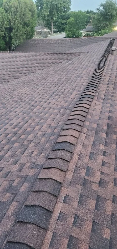 Slide of 2 Angels Roofing