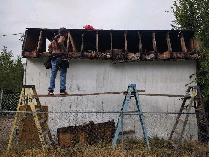 Slide of 2 Dawgs Roofing