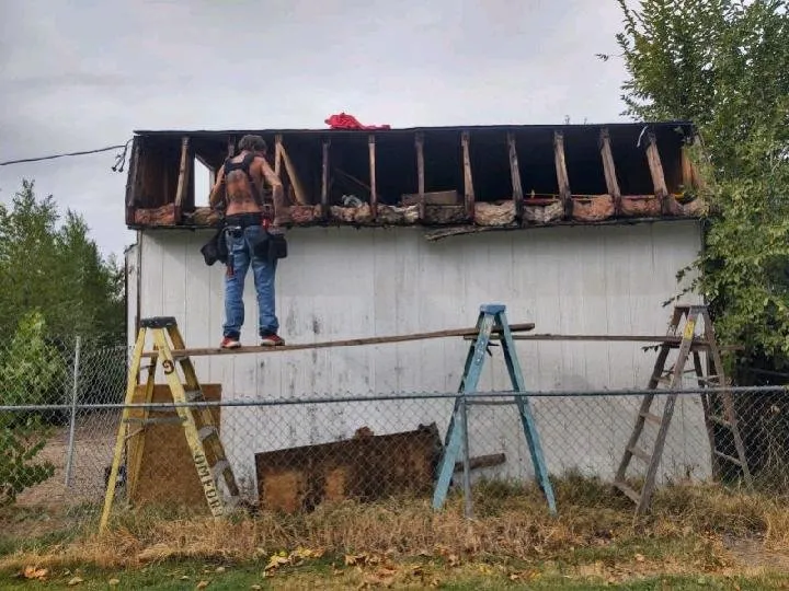 Slide of 2 Dawgs Roofing