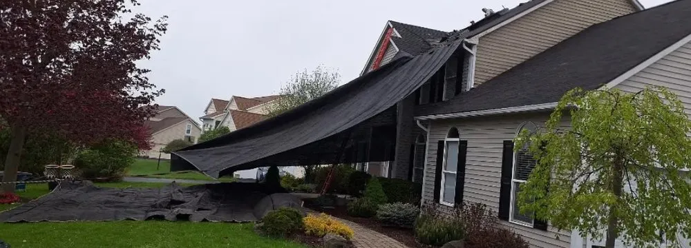 Emergency storm damage roof repair in jamesville, NY - 2 Guys Roofing
