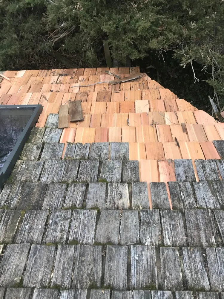 Slide of 208 Roof Repair