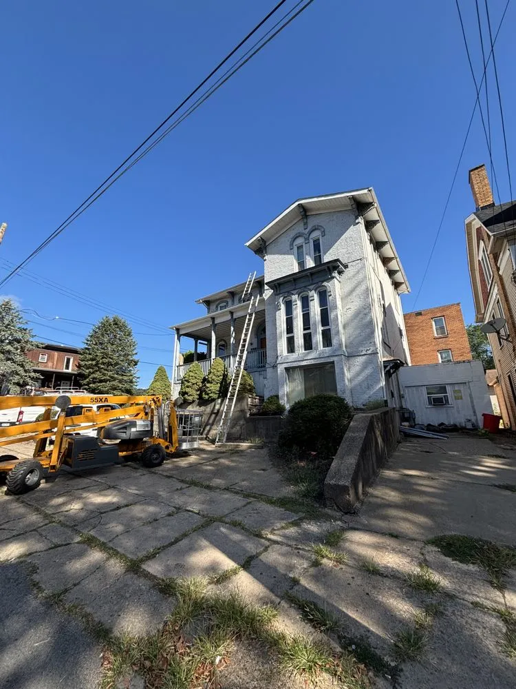 Slide of 3 Men And A Toolbelt