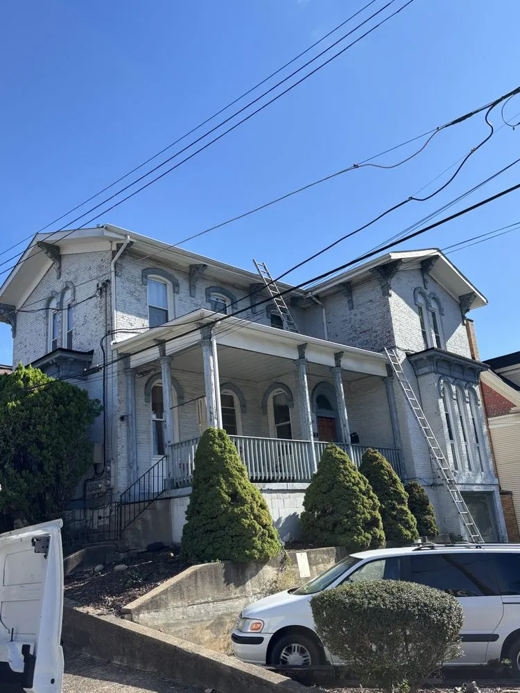 Slide of 3 Men And A Toolbelt