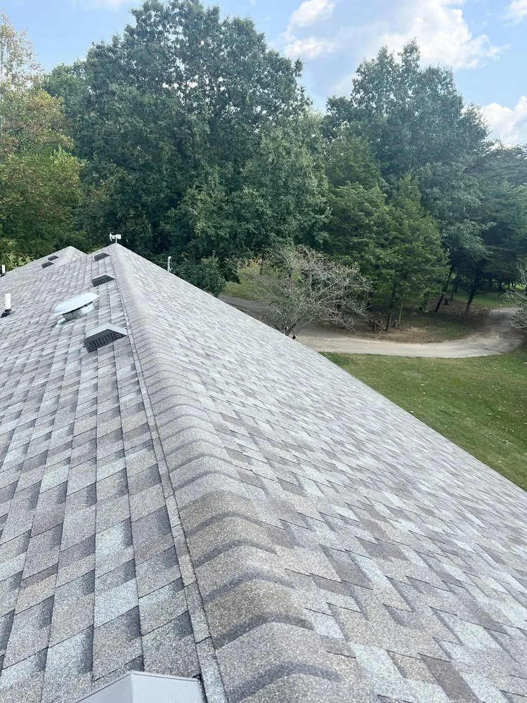 Slide of 3 Peaks Roofing