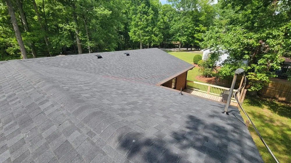 Slide of 3 Wolves Roofing