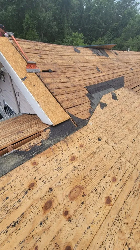 Slide of 3 Wolves Roofing