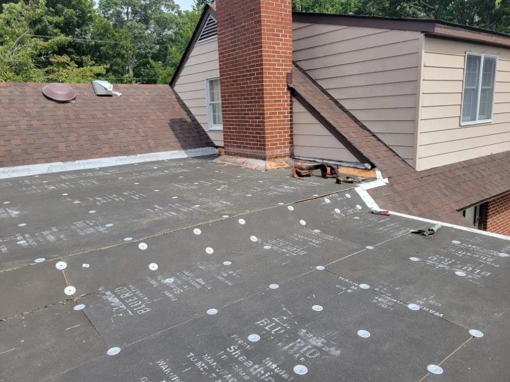 Slide of 3 Wolves Roofing