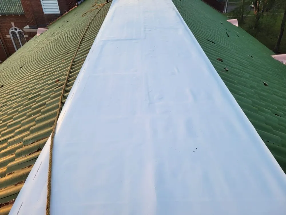 Slide of 3 Wolves Roofing