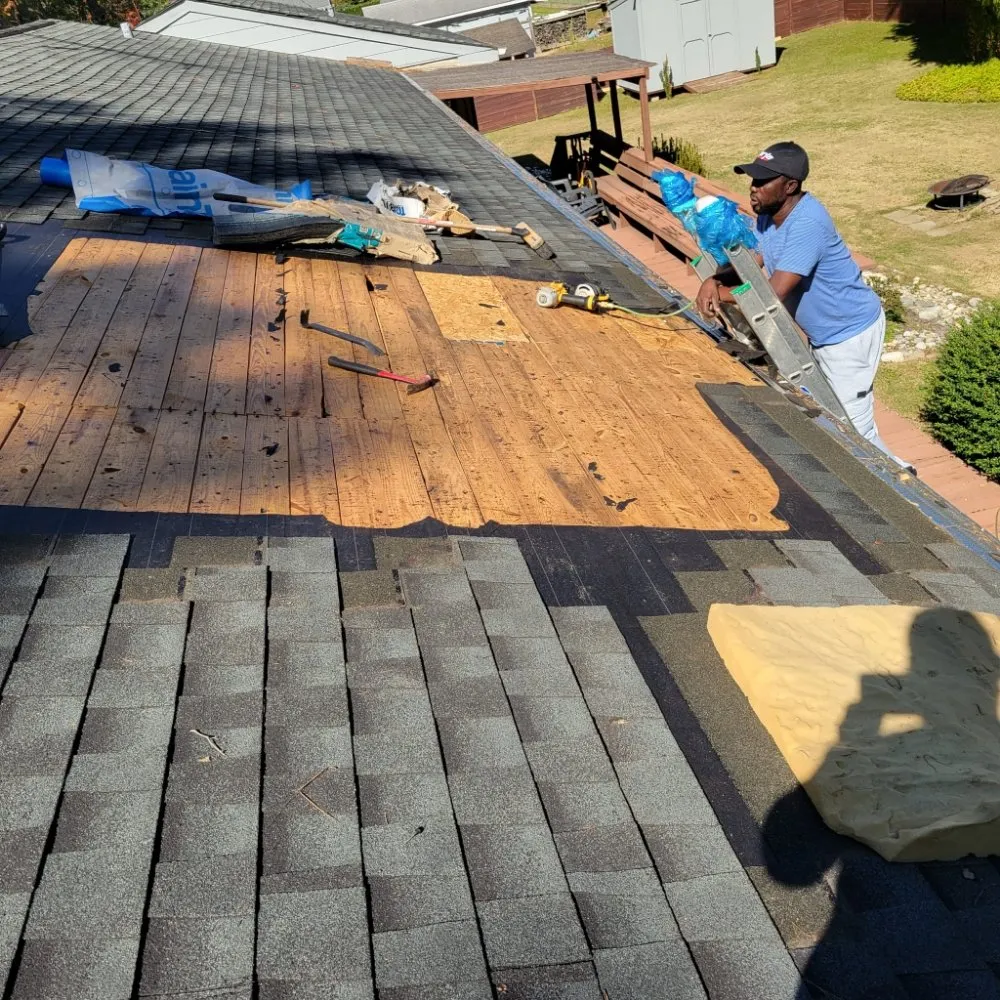 Slide of 3 Wolves Roofing