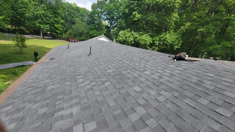 Slide of 3 Wolves Roofing