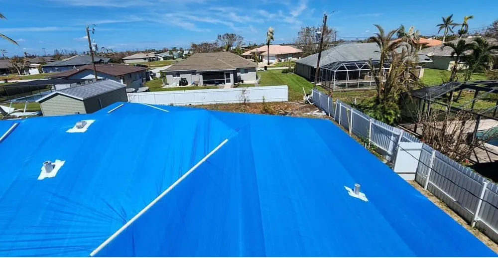Slide of 305 Roof Tarps