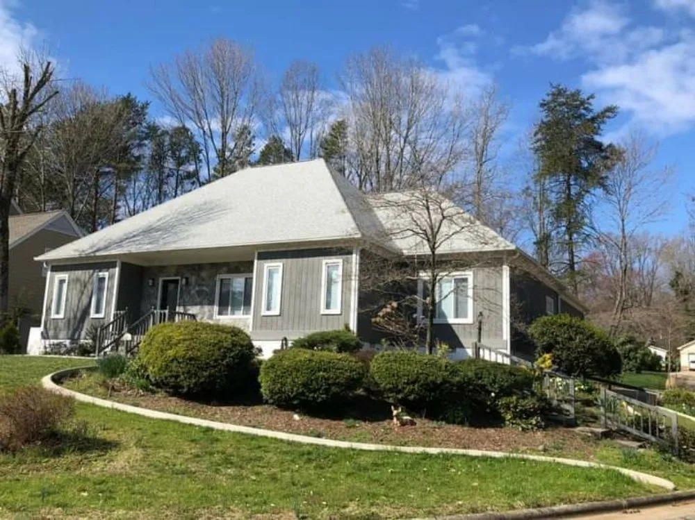 Local storm damage roof repair after storm damage in McLeansville, NC by 336 Roofing Company