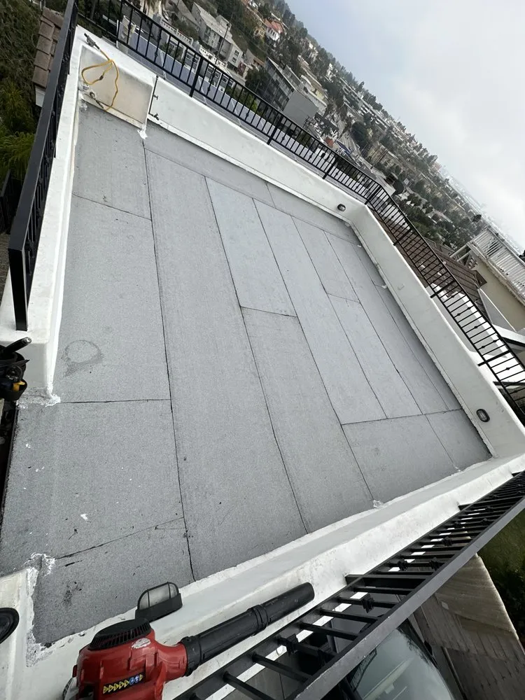 Slide of 3G Tres Generaciones Roofing