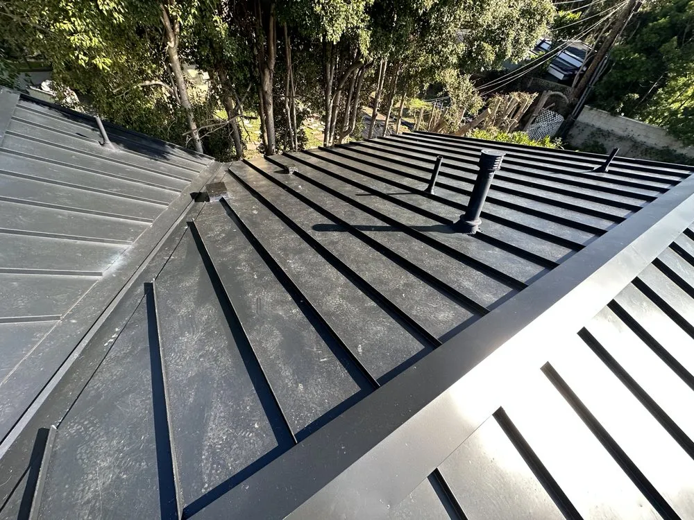 Slide of 3G Tres Generaciones Roofing