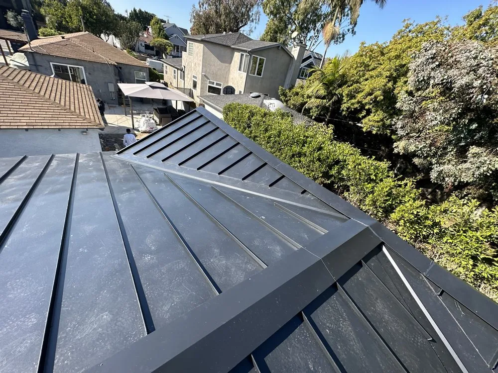 Slide of 3G Tres Generaciones Roofing