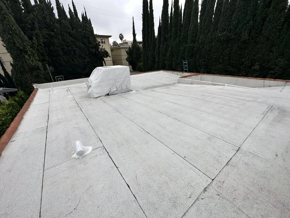 Slide of 3G Tres Generaciones Roofing