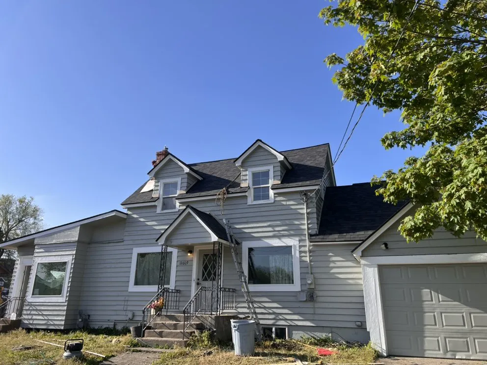 Slide of 4 Boys Roofing