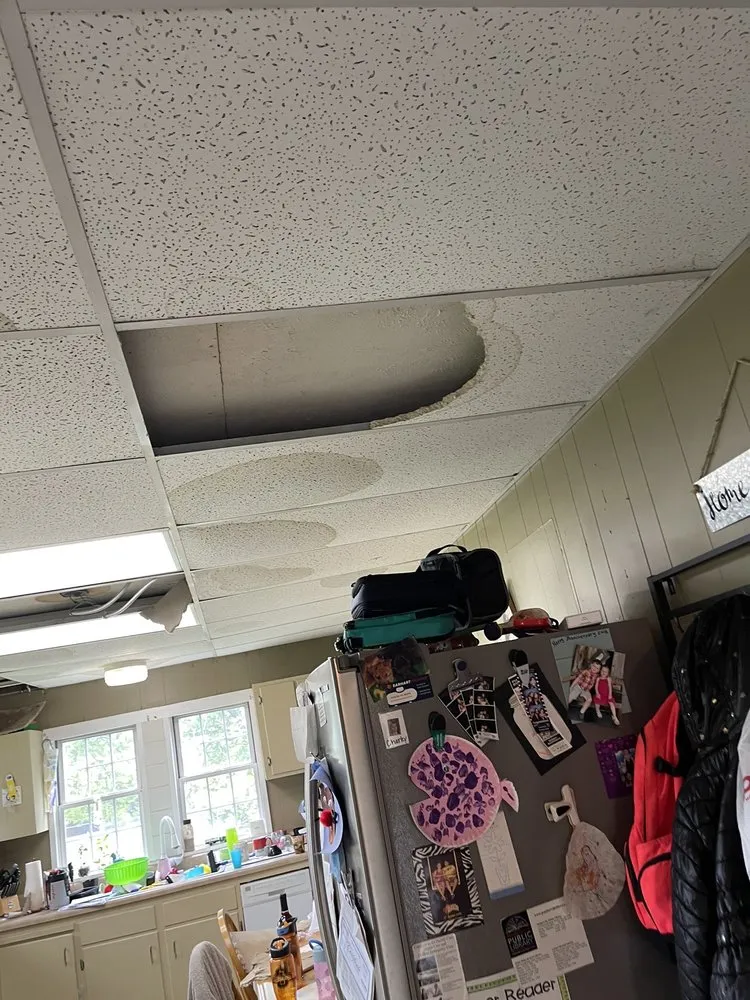 Slide of 4 Guys And A Roof