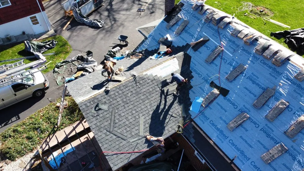 Slide of 4 Guys Roofing