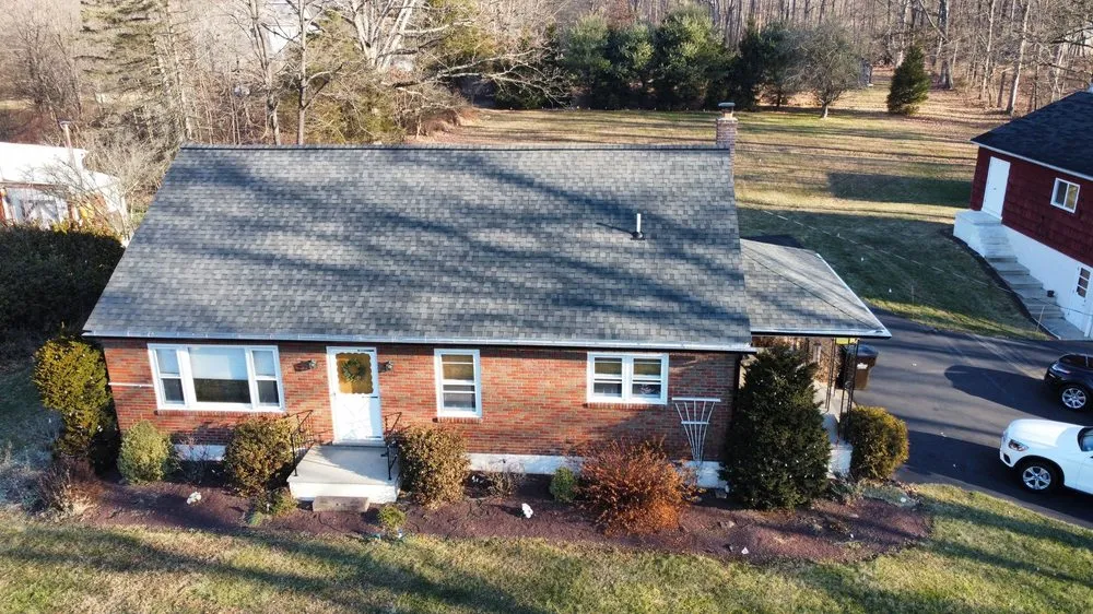 Slide of 4 Guys Roofing