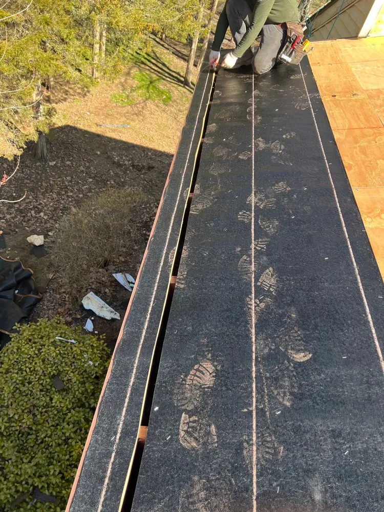 Slide of 4 Guys Roofing