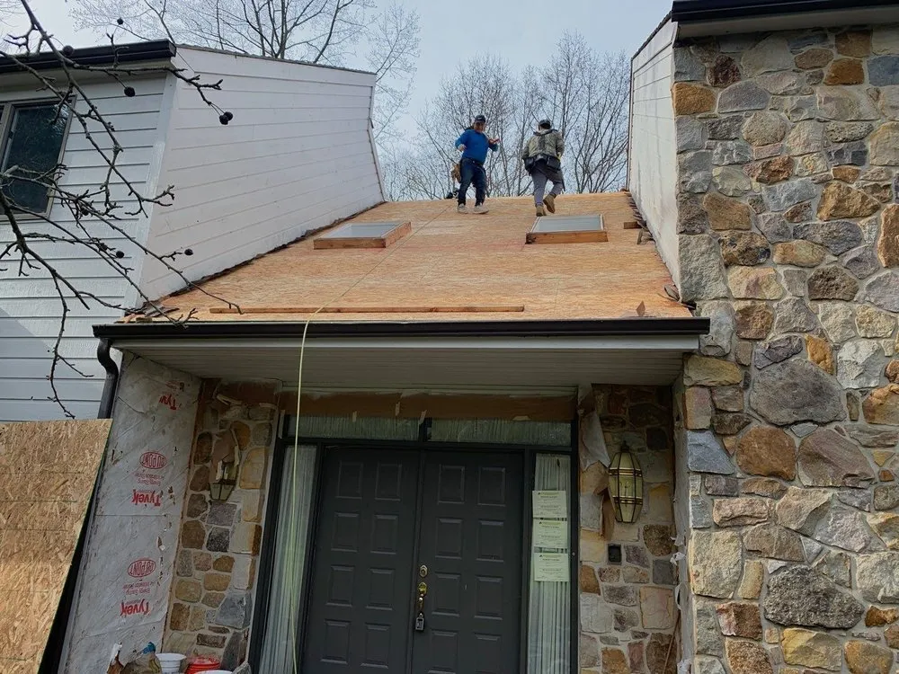 Slide of 4 Guys Roofing