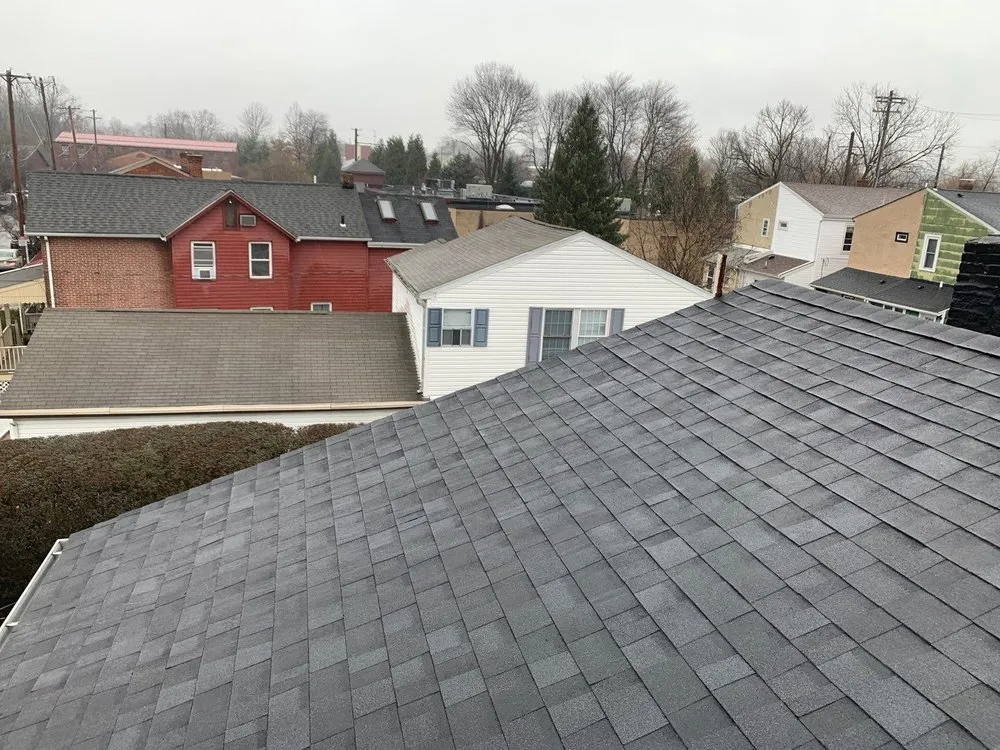 Slide of 4 Guys Roofing