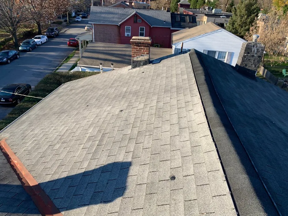 Slide of 4 Guys Roofing