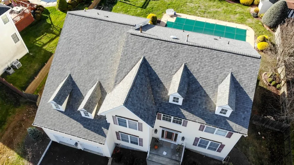 Local shingle roofing service after storm damage in Wall Township, NJ by 4 Seasons Roofing