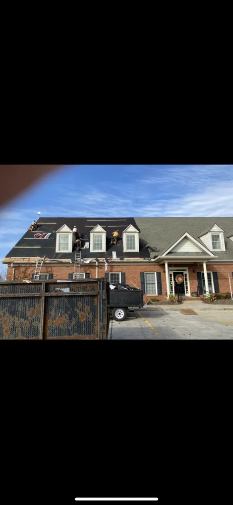 Slide of 4 Sons Roofing