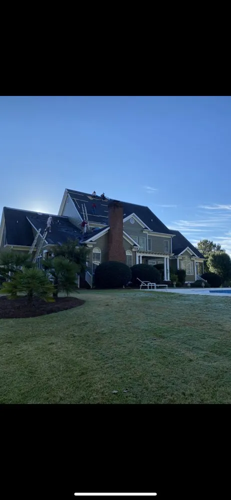 Slide of 4 Sons Roofing