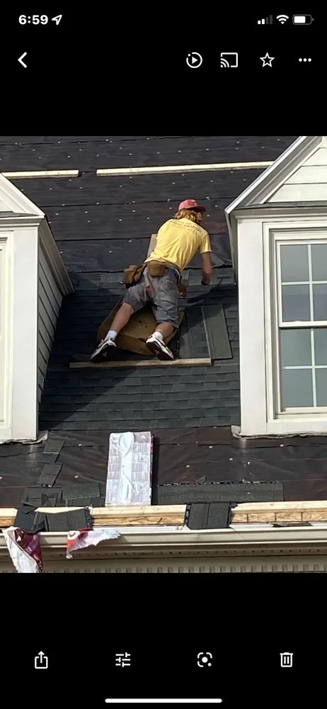 Slide of 4 Sons Roofing