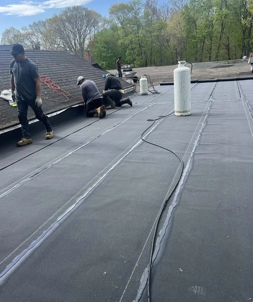 Slide of 401 Roofing And Paving