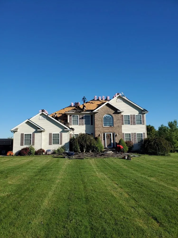 Slide of 4k Roofing & Restoration