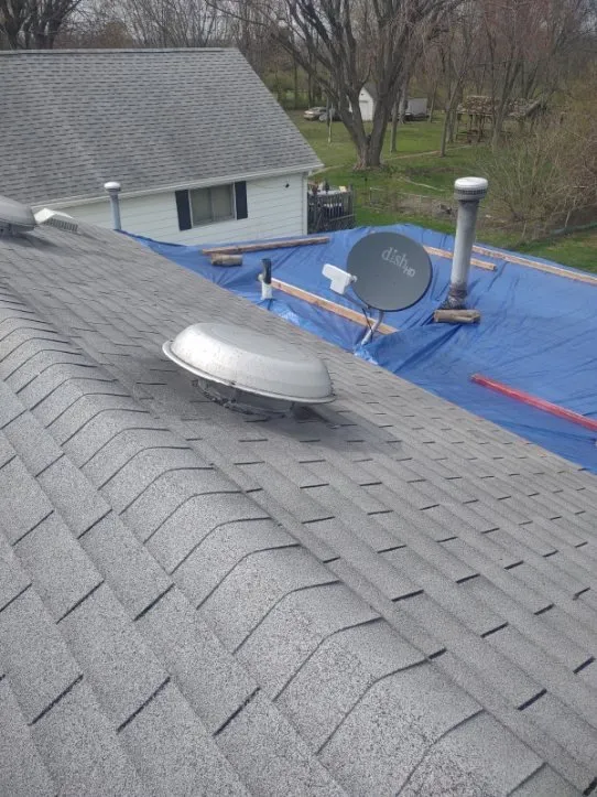 Slide of 4MenRoofing