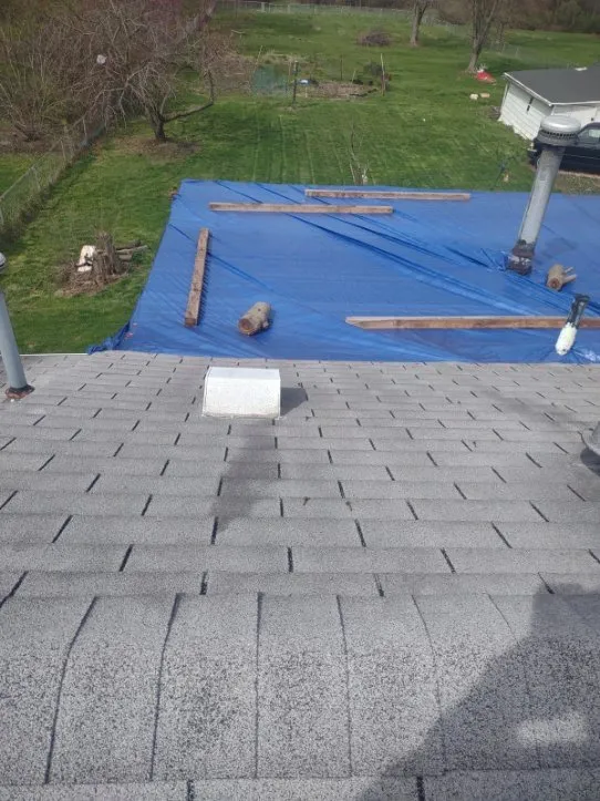 Slide of 4MenRoofing