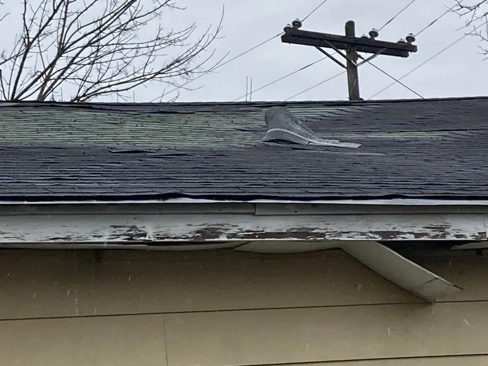 Slide of 4MenRoofing