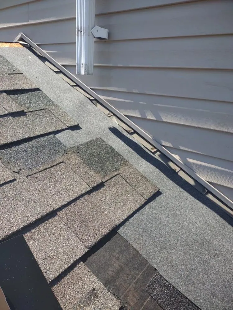 Slide of 4MenRoofing